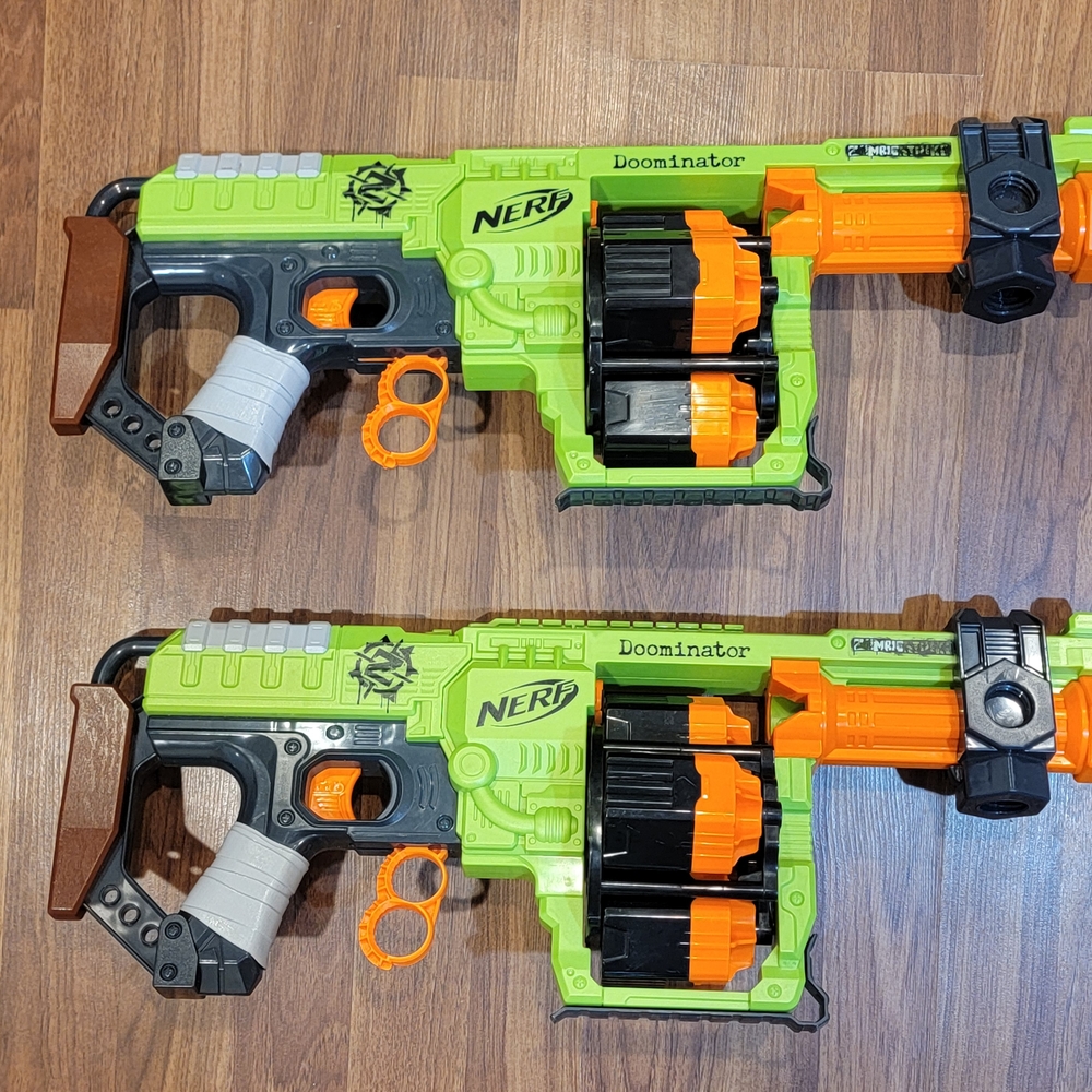 Set Of 2 Nerf Dominator Blaster - Green, Orange, and Black